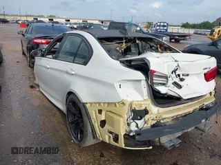 2018 BMW M3 z VIN WBS8M9C52J5K99006, wystawiony jako IAAI lot #40894548 z przebiegiem Nie podano mil oraz . Historia ofert i sprzedaży dostępna na DreamBid. Obrazek 3.