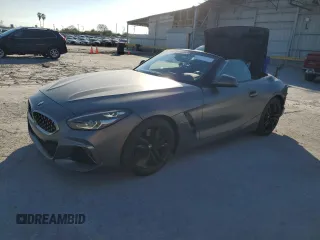2020 BMW Z4 sDriveM40i with VIN WBAHF9C0XLWW63754, listed as a Copart auction lot 82302734 with 28,156 mi miles and Salvage Title. Bid and sale history available at carsss.com. Image 1.