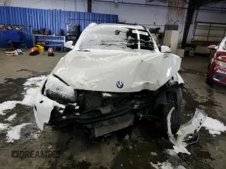 2014 BMW X1 xDrive28i with VIN WBAVL1C51EVY12411, listed as a Copart auction lot 44966055 with 76,462 mi miles and Salvage Title. Bid and sale history available at carsss.com. Image 5.