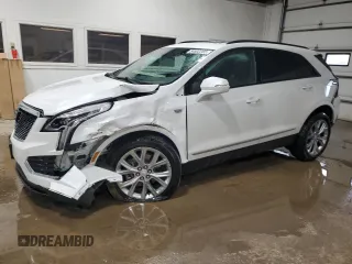 2021 Cadillac XT5 AWD Sport z VIN 1GYKNGRS5MZ142444, wystawiony jako Copart lot #54502285 z przebiegiem 27 070 mil mil oraz Szkoda całkowita • Salvage title. Historia ofert i sprzedaży dostępna na DreamBid. Obrazek 1.