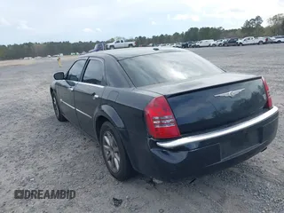 2006 Chrysler 300 C with VIN 2C3KA63H36H455735, listed as a IAAI auction lot 41875033 with 175,251 mi miles. Bid and sale history available at carsss.com. Image 3.