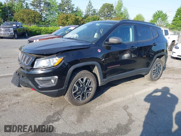 2019 Jeep Compass Trailhawk with VIN 3C4NJDDB5KT800515, listed as a IAAI auction lot 42059594 with 60,338 mi miles and . Bid and sale history available at DreamBid. Image 17.