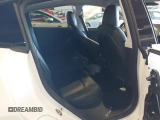 2021 Tesla Model Y Performance with VIN 5YJYGDEF4MF263473, listed as a IAAI auction lot 41851083 with 39,289 mi miles and . Bid and sale history available at DreamBid. Image 8.