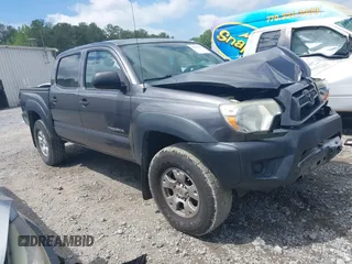 2015 Toyota Tacoma PreRunner z VIN 5TFJX4GNXFX039901, wystawiony jako IAAI lot #42205434 z przebiegiem 115 486 mil mil oraz . Historia ofert i sprzedaży dostępna na DreamBid. Obrazek 1.
