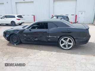 2016 Dodge Challenger R/T Plus with VIN 2C3CDZBT7GH177992, listed as a IAAI auction lot 42136475 with 132,808 mi miles and . Bid and sale history available at DreamBid. Image 14.