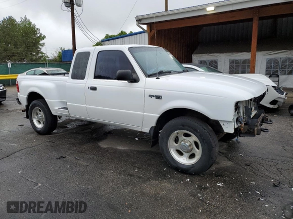 2002 Ford Ranger XL Fleet with VIN 1FTZR45EX2PA97839, listed as a Copart auction lot 59318905 with 213,399 mi miles and Clean title. Bid and sale history available at DreamBid. Image 4.