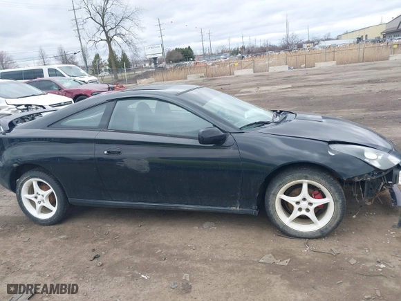 2000 Toyota Celica GT with VIN JTDDR32T7Y0006809, listed as a IAAI auction lot 41860933 with 262,014 mi miles. Bid and sale history available at carsss.com. Image 13.