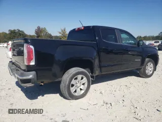 2015 GMC Canyon 2WD SLE with VIN 1GTG5BEA6F1221120, listed as a Copart auction lot 77391484 with 180,334 mi miles and Salvage Title. Bid and sale history available at carsss.com. Image 3.