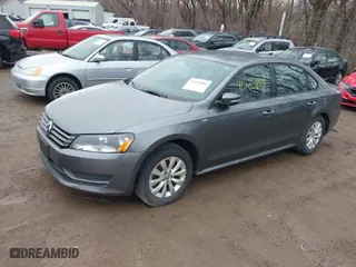 2014 Volkswagen Passat Wolfsburg Ed with VIN 1VWAT7A37EC100581, listed as a IAAI auction lot 41535884 with 119,169 mi miles. Bid and sale history available at carsss.com. Image 2.