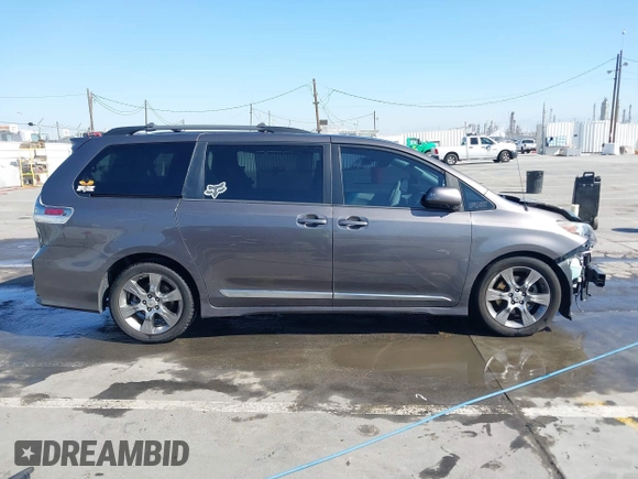 2012 Toyota Sienna SE with VIN 5TDXK3DCXCS233593, listed as a IAAI auction lot 41959611 with 85,558 mi miles. Bid and sale history available at carsss.com. Image 14.