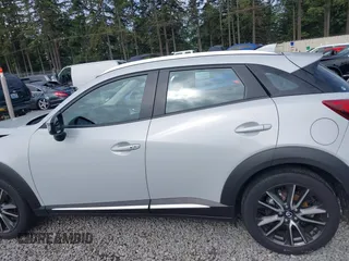 2017 Mazda CX-3 Grand Touring z VIN JM1DKFD70H0159621, wystawiony jako IAAI lot #42331482 z przebiegiem 55 166 mil mil oraz . Historia ofert i sprzedaży dostępna na DreamBid. Obrazek 14.