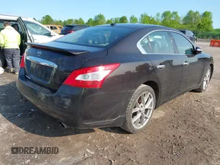 2011 Nissan Maxima SV with VIN 1N4AA5AP5BC853124, listed as a IAAI auction lot 42391492 with 152,097 mi miles and . Bid and sale history available at DreamBid. Image 4.
