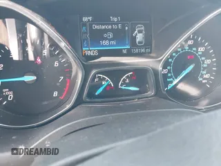 2015 Ford Escape Titanium with VIN 1FMCU9J98FUC76491, listed as a IAAI auction lot 41790638 with 158,196 mi miles and . Bid and sale history available at DreamBid. Image 7.