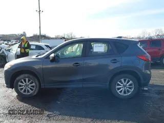 2015 Mazda CX-5 Sport with VIN JM3KE4BY1F0543507, listed as a IAAI auction lot 41530491 with 127,995 mi miles. Bid and sale history available at carsss.com. Image 14.