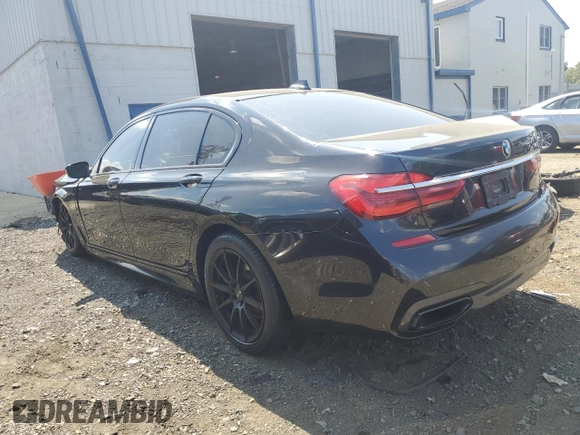2017 BMW 7 Series 740e xDrive iPerformance with VIN WBA7J2C32HG497906, listed as a Copart auction lot 68861214 with 0 mi miles and Salvage Title. Bid and sale history available at carsss.com. Image 2.