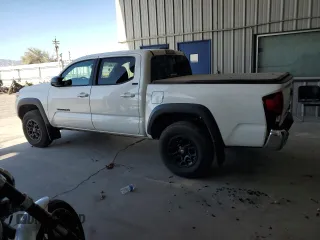 2023 Toyota Tacoma SR5 z VIN 3TMAZ5CN3PM219718, wystawiony jako Copart lot #55253845 z przebiegiem 18 879 mil mil oraz Szkody całkowita. Historia ofert i sprzedaży dostępna na DreamBid. Obrazek 2.