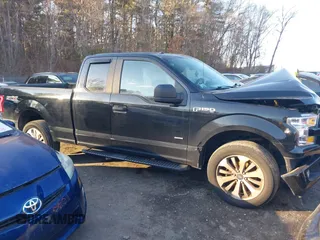 2017 Ford F-150 XL with VIN 1FTEX1EPXHFC22504, listed as a IAAI auction lot 41256497 with 148,434 mi miles. Bid and sale history available at carsss.com. Image 13.