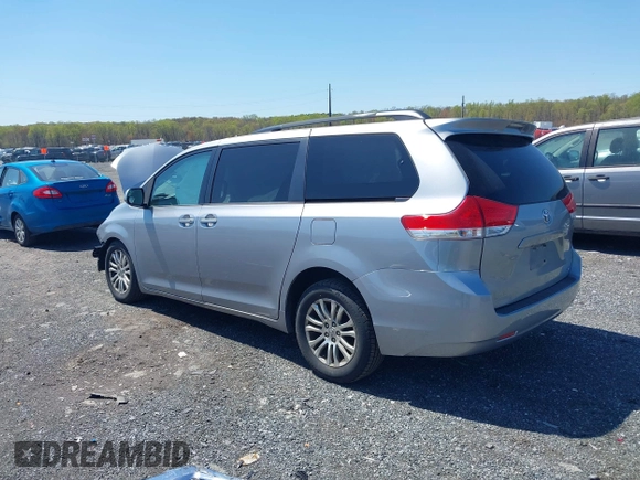 2013 Toyota Sienna XLE AAS with VIN 5TDYK3DC7DS299024, listed as a IAAI auction lot 42055130 with 349,520 mi miles. Bid and sale history available at carsss.com. Image 3.