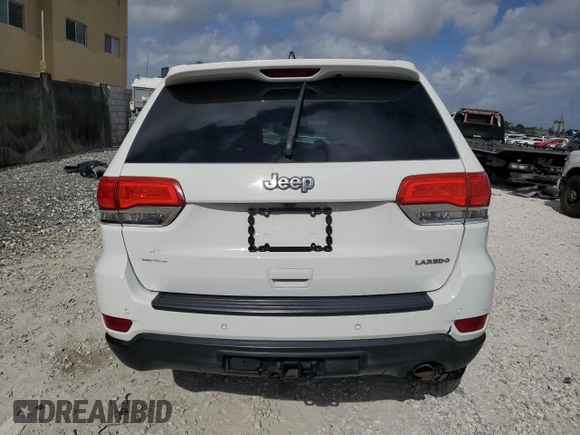 2016 Jeep Grand Cherokee Laredo z VIN 1C4RJEAG6GC390768, wystawiony jako Copart lot #51459885 z przebiegiem 130 690 mil mil oraz Szkoda całkowita • Salvage title. Historia ofert i sprzedaży dostępna na DreamBid. Obrazek 6.