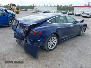 2016 Tesla Model S 70 with VIN 5YJSA1E10GF141725, listed as a IAAI auction lot 41878171 with 119,025 mi miles and . Bid and sale history available at DreamBid. Image 4.