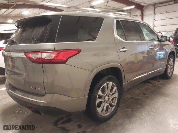 2018 Chevrolet Traverse Premier with VIN 1GNEVJKW0JJ165144, listed as a IAAI auction lot 41129951 with 137,593 mi miles. Bid and sale history available at carsss.com. Image 4.