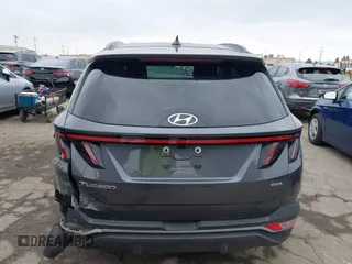 2023 Hyundai Tucson SEL z VIN KM8JBCAE9PU242486, wystawiony jako IAAI lot #41860406 z przebiegiem 25 294 mil mil oraz . Historia ofert i sprzedaży dostępna na DreamBid. Obrazek 16.