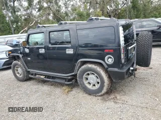 2003 Hummer H2 with VIN 5GRGN23U93H111760, listed as a Copart auction lot 79600154 with 154,552 mi miles and Salvage Title. Bid and sale history available at carsss.com. Image 2.