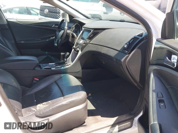 2012 Hyundai Sonata SE z VIN 5NPEC4AC9CH434373, wystawiony jako IAAI lot #42168411 z przebiegiem 120 464 mil mil oraz . Historia ofert i sprzedaży dostępna na DreamBid. Obrazek 5.