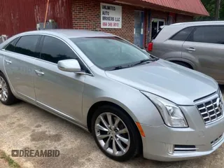 2013 Cadillac XTS Luxury z VIN 2G61P5S33D9171411, wystawiony jako Copart lot #59880945 z przebiegiem 268 029 mil mil oraz Tytuł czysty. Historia ofert i sprzedaży dostępna na DreamBid. Obrazek 1.