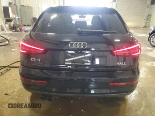 2017 Audi Q3 Premium z VIN WA1ECCFS4HR009065, wystawiony jako Copart lot #51981845 z przebiegiem 87 283 mil mil oraz Tytuł czysty. Historia ofert i sprzedaży dostępna na DreamBid. Obrazek 6.