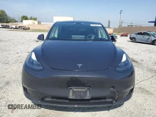 2024 Tesla Model Y Long Range z VIN 7SAYGDEE3RF121102, wystawiony jako Copart lot #60548895 z przebiegiem 13 336 mil mil oraz Szkoda całkowita • Salvage title. Historia ofert i sprzedaży dostępna na DreamBid. Obrazek 5.