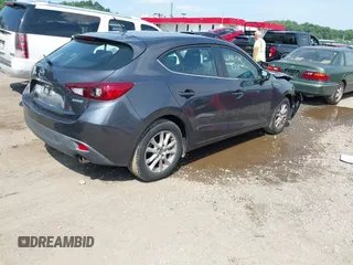 2015 Mazda 3 i Touring with VIN 3MZBM1L73FM193453, listed as a IAAI auction lot 42461581 with 95,885 mi miles and . Bid and sale history available at DreamBid. Image 4.