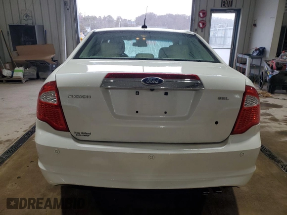 2012 Ford Fusion SEL with VIN 3FAHP0JA9CR167134, listed as a Copart auction lot 50869835 with 128,956 mi miles and Salvage Title. Bid and sale history available at DreamBid. Image 6.