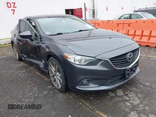 2015 Mazda 6 i Grand Touring with VIN JM1GJ1W55F1206373, listed as a IAAI auction lot 41606107 with 143,494 mi miles and . Bid and sale history available at carsss.com. Image 1.