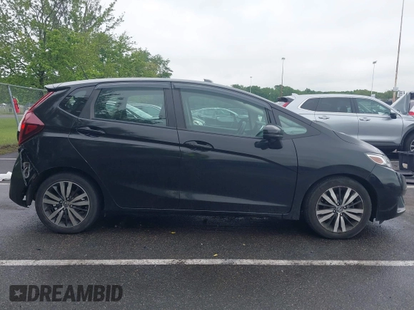 2015 Honda Fit EX-L z VIN 3HGGK5H81FM778816, wystawiony jako IAAI lot #42376942 z przebiegiem 155 374 mil mil oraz . Historia ofert i sprzedaży dostępna na DreamBid. Obrazek 13.