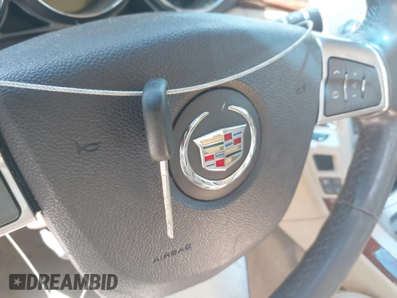 2012 Cadillac CTS Luxury with VIN 1G6DF5E50C0131857, listed as a IAAI auction lot 42610389 with 85,896 mi miles and . Bid and sale history available at DreamBid. Image 11.