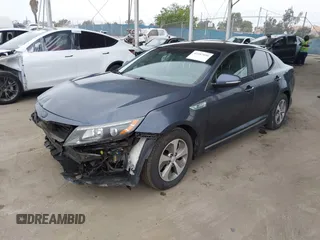 2014 Kia Optima LX z VIN KNAGM4AD8E5065584, wystawiony jako IAAI lot #42287890 z przebiegiem 134 565 mil mil oraz . Historia ofert i sprzedaży dostępna na DreamBid. Obrazek 2.