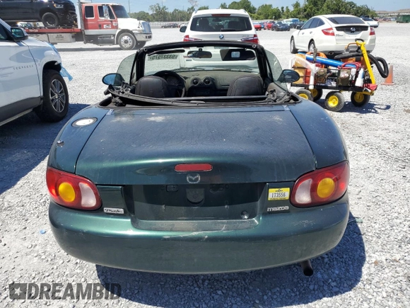 1999 Mazda MX-5 Miata with VIN JM1NB3530X0118452, listed as a Copart auction lot 53337575 with 150,574 mi miles and Clean title. Bid and sale history available at DreamBid. Image 6.