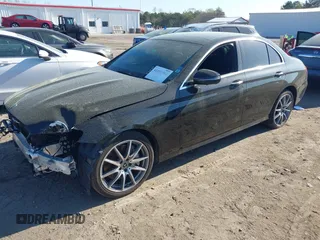 2022 Mercedes-Benz E 350 with VIN W1KZF8DB1NB085013, listed as a IAAI auction lot 41881502 with 83,238 mi miles and . Bid and sale history available at DreamBid. Image 2.