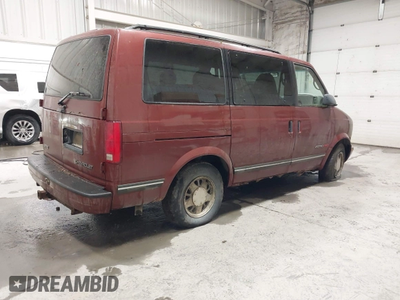 1998 Chevrolet Astro with VIN 1GNEL19W3WB115660, listed as a IAAI auction lot 42141028 with 95,538 mi miles. Bid and sale history available at carsss.com. Image 4.