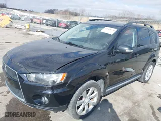 2010 Mitsubishi Outlander XLS with VIN JA4JT4AX6AZ002549, listed as a IAAI auction lot 41669290 with 136,757 mi miles. Bid and sale history available at carsss.com. Image 2.