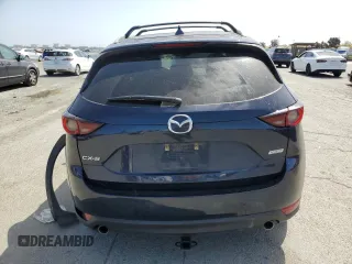 2018 Mazda CX-5 Touring with VIN JM3KFACM6J1323449, listed as a Copart auction lot 54090445 with 93,748 mi miles and Salvage Title. Bid and sale history available at carsss.com. Image 6.