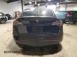 2024 Tesla Model Y с VIN 7SAYGDED0RF084081, выставлен на аукционе Copart как лот 55992195 с пробегом 43 871 миль миль и Списание • Salvage title. История ставок и продаж доступна на DreamBid. Изображение 6.