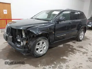 2014 Jeep Grand Cherokee Laredo with VIN 1C4RJFAG4EC186926, listed as a IAAI auction lot 41745168 with 128,519 mi miles. Bid and sale history available at carsss.com. Image 2.
