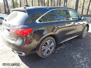 2017 Acura MDX w/Technology Pkg with VIN 5FRYD4H51HB006562, listed as a IAAI auction lot 41656371 with 64,142 mi miles. Bid and sale history available at carsss.com. Image 4.