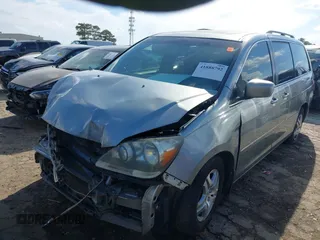 2007 Honda Odyssey EX-L with VIN 5FNRL38677B054173, listed as a IAAI auction lot 41888792 with 142,438 mi miles and . Bid and sale history available at DreamBid. Image 2.