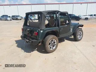 2002 Jeep Wrangler Sport with VIN 1J4FA49S52P760173, listed as a IAAI auction lot 42468550 with 201,682 mi miles and . Bid and sale history available at DreamBid. Image 4.