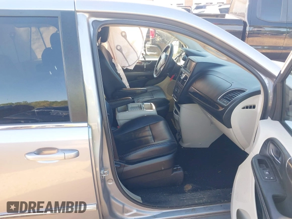 2015 Chrysler Town & Country Touring with VIN 2C4RC1BG9FR715307, listed as a IAAI auction lot 41988281 with 164,167 mi miles. Bid and sale history available at carsss.com. Image 5.