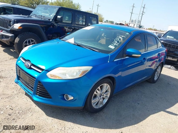 2012 Ford Focus SEL with VIN 1FAHP3H25CL415314, listed as a IAAI auction lot 41849302 with 164,022 mi miles. Bid and sale history available at carsss.com. Image 2.