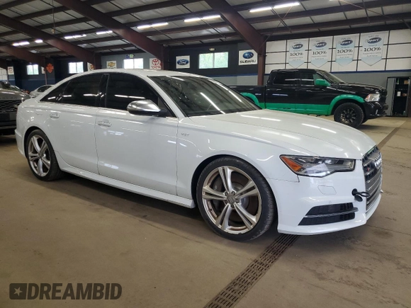 2016 Audi S6 Premium Plus z VIN WAUF2AFCXGN014946, wystawiony jako Copart lot #56903155 z przebiegiem 103 025 mil mil oraz Tytuł czysty. Historia ofert i sprzedaży dostępna na DreamBid. Obrazek 4.